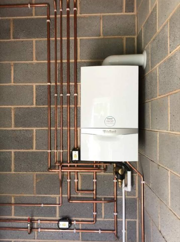 Vaillant boiler and copper pipework installation